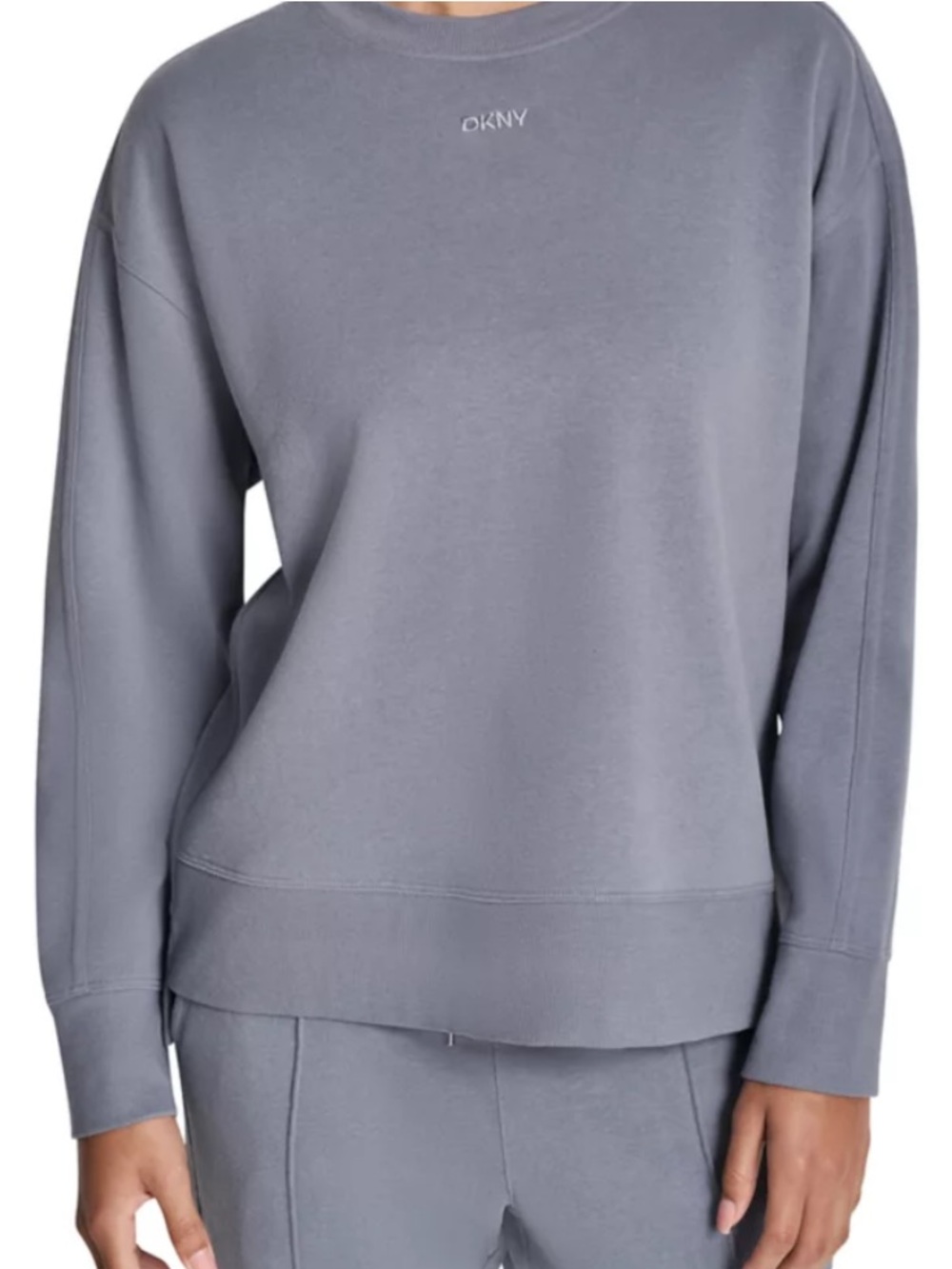 DKNY woman’s Crewneck Sweatshirt
Size Large